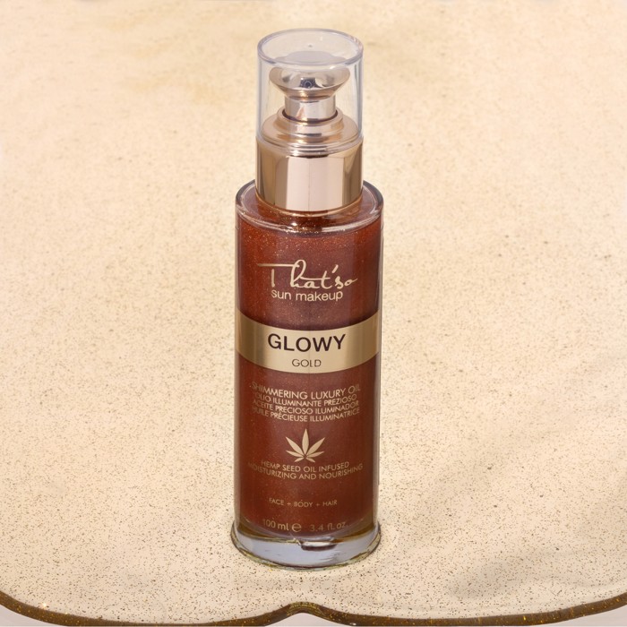 That'so Glowy Gold Shimmering Oil Enudatiko Xiro Ladi Lampsis ga Prosopo Soma Mallia me Elaio Kannabis 100ml